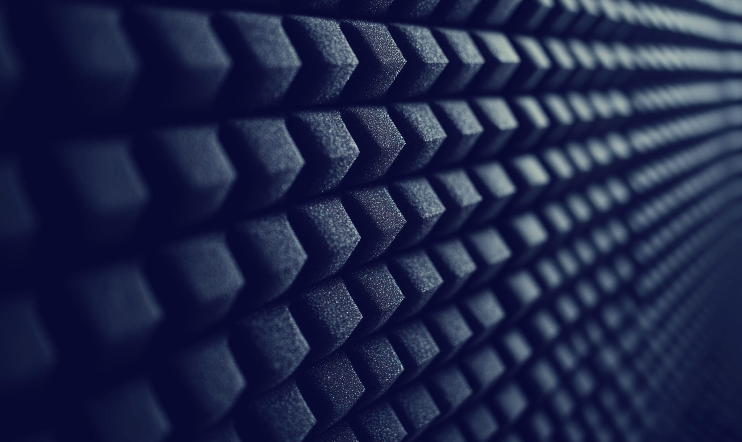 Close-up of sound-proofing foam representing DCMM's sound absorption solutions